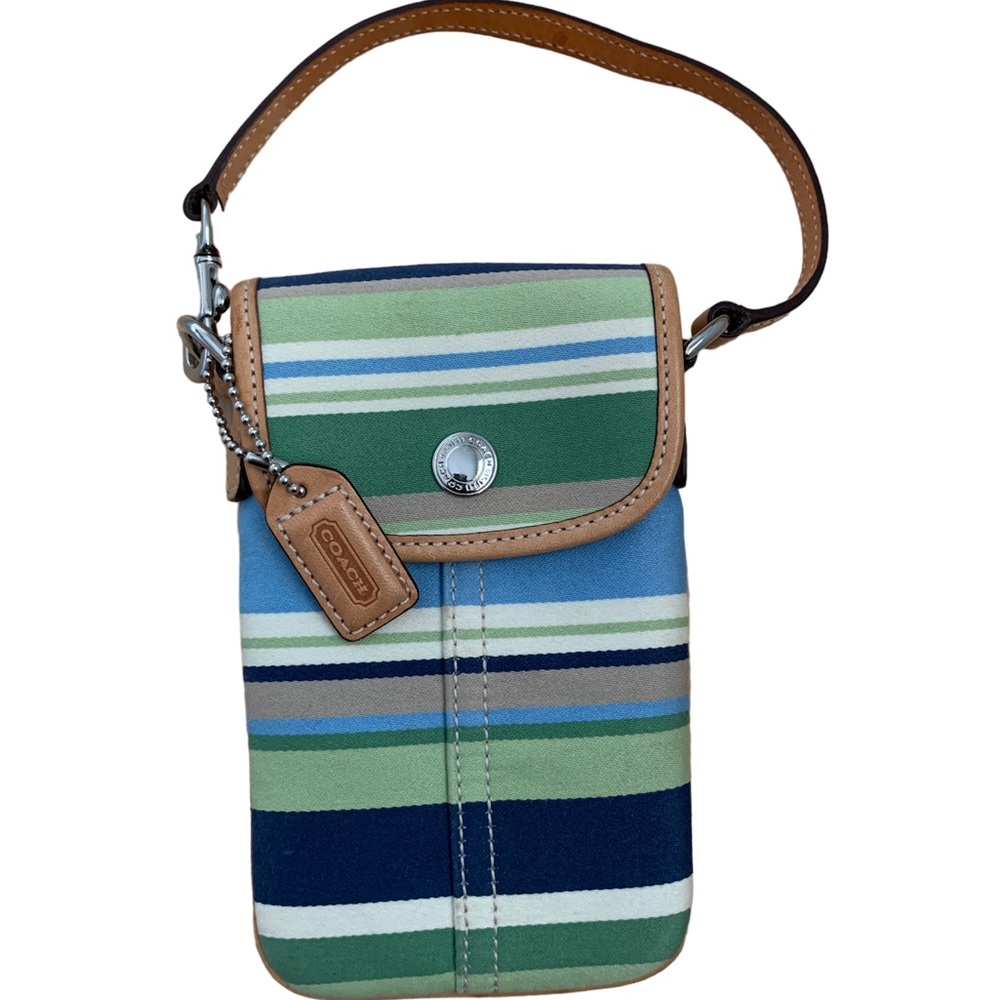 Coach Wristlet, neutral striped. Like new condition.